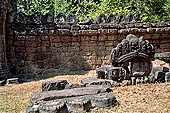 Ta Som temple - fragments of bas relief left on the ground.